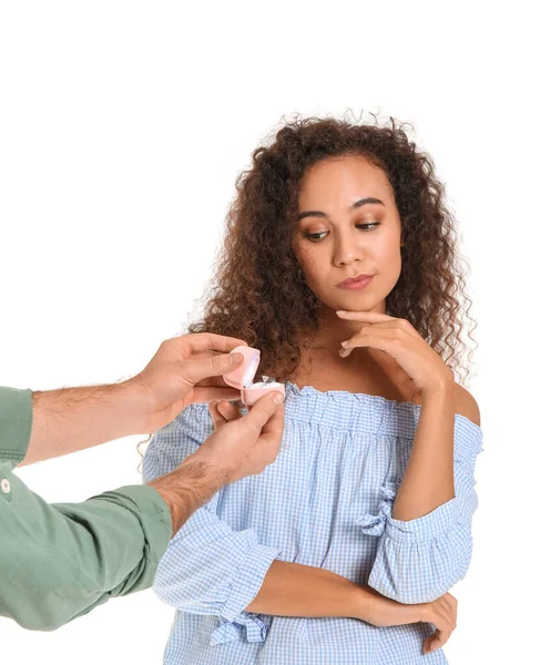 Young Man Proposing His Thoughtful Girlfriend White Background — ストック写真