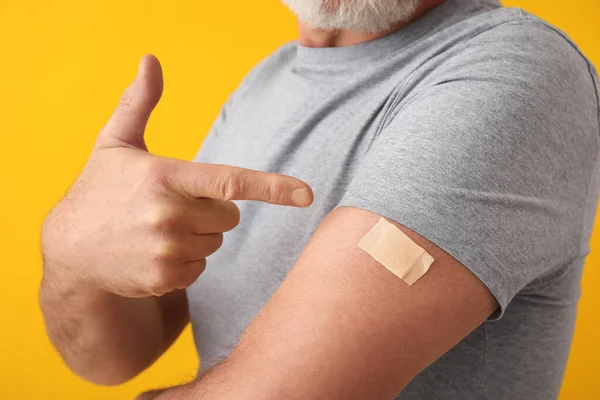 Mature Man Applied Nicotine Patch Color Background Smoking Cessation — Stockfoto