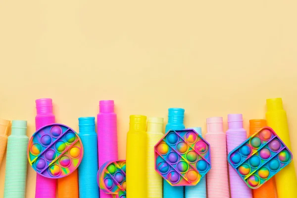 Colorido Pop Tubes Pop Fidget Brinquedos Fundo Amarelo — Fotografia de Stock