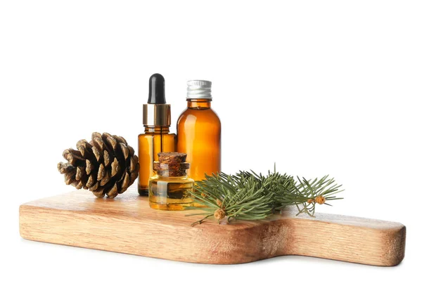 Wooden Board Bottles Essential Oil Cone Fir Branch White Background — Stock Photo, Image