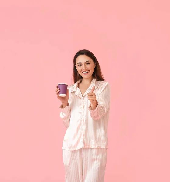 Beautiful Woman Pajamas Cup Coffee Showing Thumb Color Background — Stockfoto