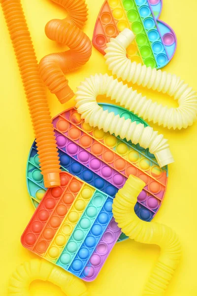 Colorato Pop Tubes Pop Fidget Giocattoli Sfondo Giallo — Foto Stock