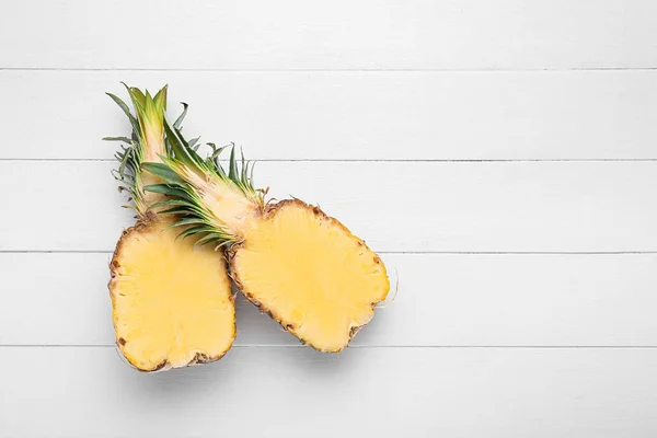Halves Juicy Pineapple Light Wooden Background — стоковое фото
