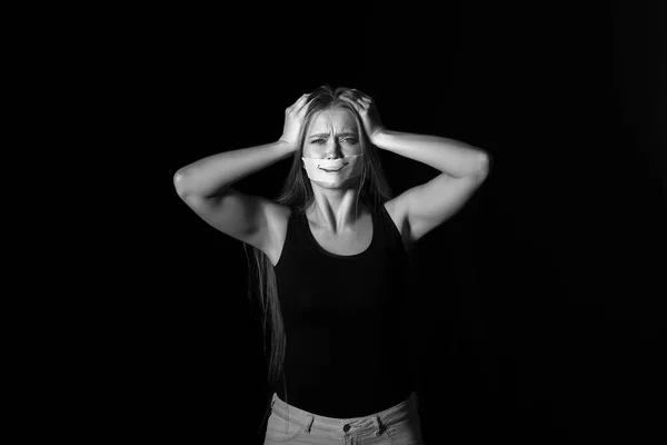 Scared Woman Drawn Smile Her Taped Mouth Dark Background Violence — Stock Photo, Image