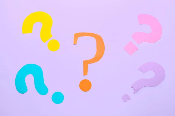 Question Marks Made Paper Lilac Background — 图库照片