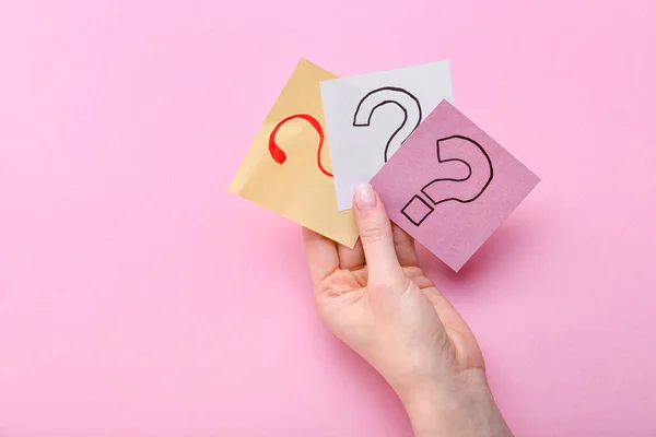 Woman Holding Sticky Notes Question Marks Pink Background — Stock Fotó