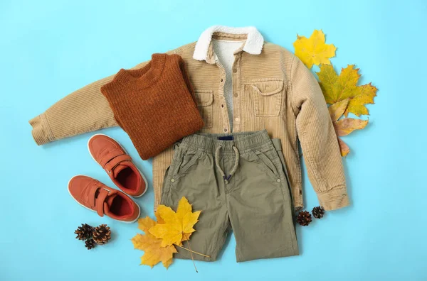 Set Stylish Kid Clothes Autumn Decor Color Background — стоковое фото