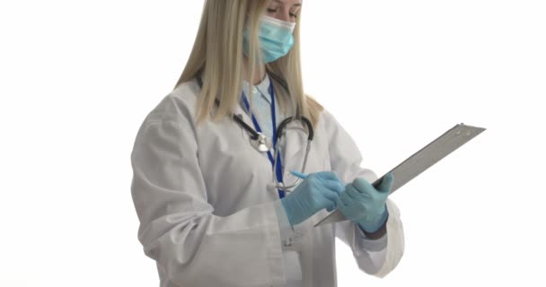 Doctor Medical Mask Rubber Gloves Clipboard White Background — Vídeo de Stock