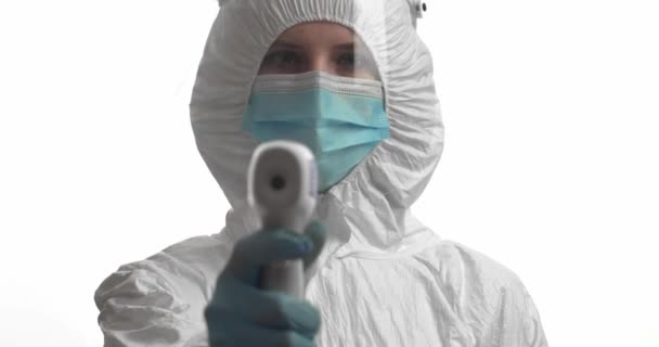 Doctor Protective Suit Infrared Thermometer White Background — Video Stock