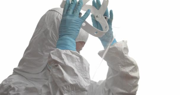 Doctor Taking Protective Suit White Background — Video Stock