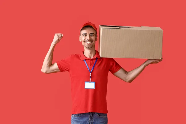 Strong Male Courier Parcel Color Background — Stock Photo, Image