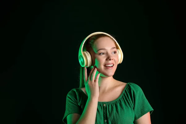 Cool Young Woman Listening Music Dark Background — Fotografia de Stock