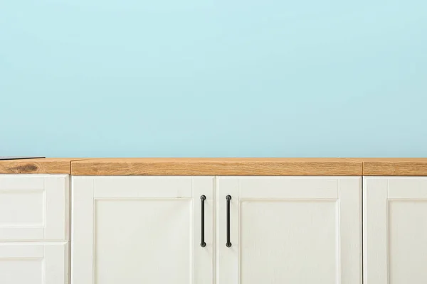 White Wooden Counters Blue Wall — 图库照片