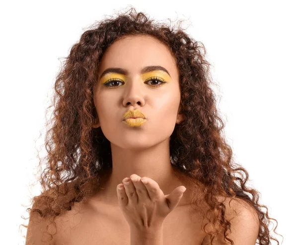 Beautiful African American Woman Makeup Yellow Tones Blowing Kiss White — Stock Photo, Image