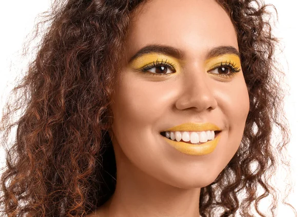 Beautiful African American Woman Makeup Yellow Tones White Background — стоковое фото