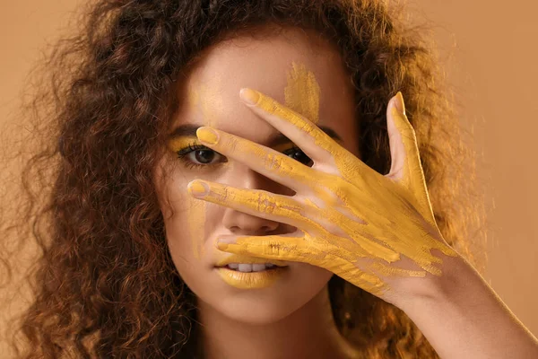 Beautiful Young Woman Yellow Paint Her Face Body Color Background — Stock Photo, Image