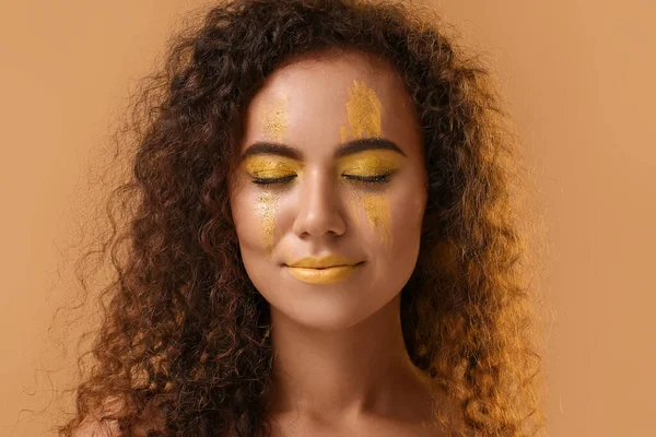 Beautiful Young Woman Yellow Paint Her Face Color Background — Fotografia de Stock