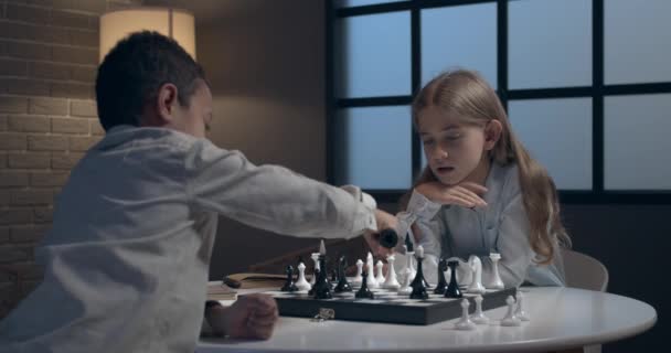 Little Children Playing Chess Home Evening — Stockvideo