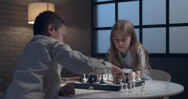 Little Children Playing Chess Home Evening — Video Stock