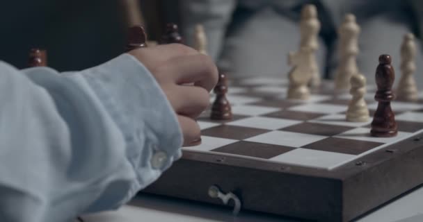 Little Children Playing Chess Home Closeup — Stockvideo