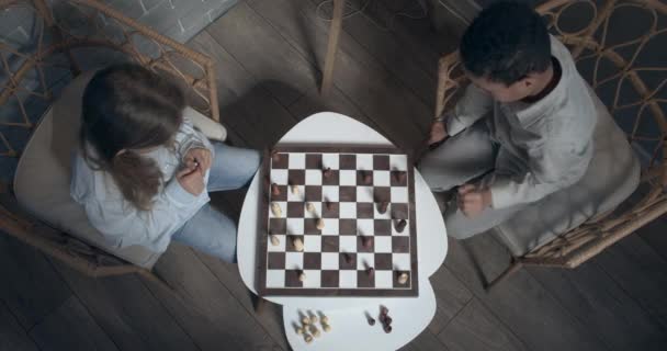 Little Children Playing Chess Home Evening Top View — Stockvideo