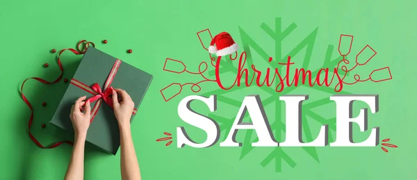 Woman Decorating Gift Box Green Background Christmas Sale — 스톡 사진