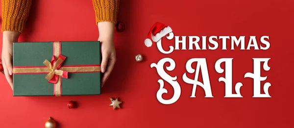 Female Hands Gift Box Red Background Christmas Sale — Foto Stock