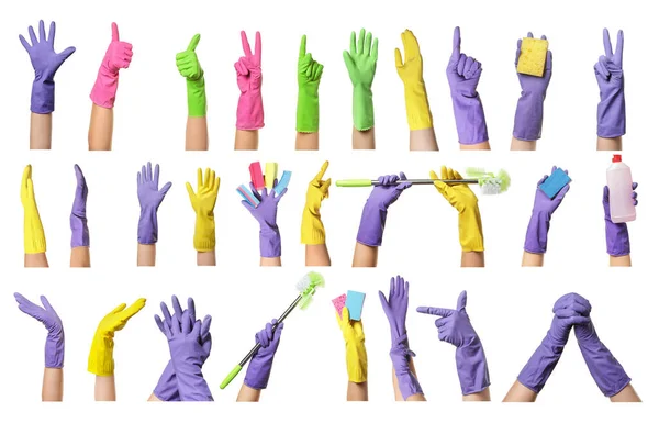 ゴム手袋と白の背景に掃除用品で手 — ストック写真