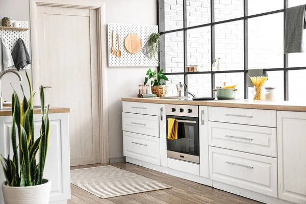 Interior Modern Kitchen White Counters Door Peg Boards — Stock Photo, Image