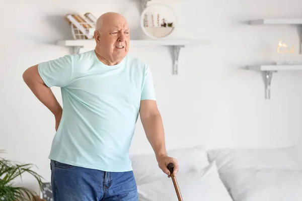 Senior Man Walking Stick Suffering Back Pain Bedroom — Stockfoto