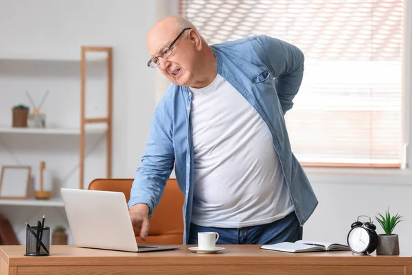 Senior Man Back Pain Using Laptop Home — Stock Fotó