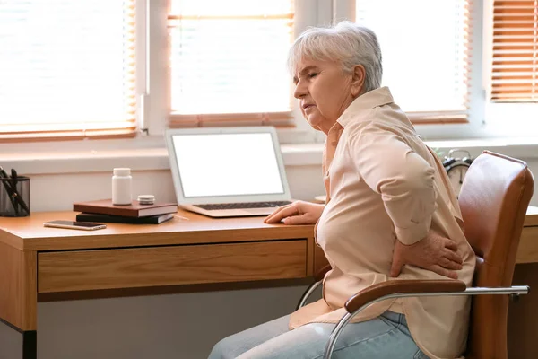 Senior Woman Suffering Back Pain Chair Home — Stock Fotó