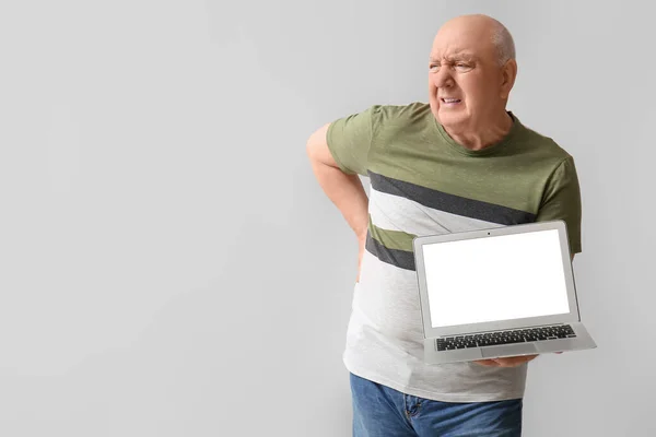 Senior Man Laptop Suffering Back Pain Light Background — Stock Photo, Image