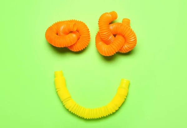 Smile Made Pop Tubes Green Background — Stock Photo, Image