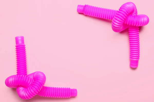 Pop Tubes Pink Background — Stock Photo, Image
