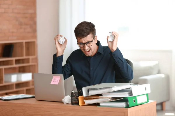 Stressed Young Man Folders Table Office — Stockfoto