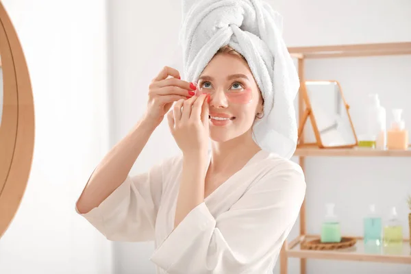 Pretty Young Woman Applying Eye Patches Bathroom Shower — Zdjęcie stockowe