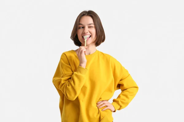 Funny Young Woman Chewing Gum Light Background — Stock Photo, Image
