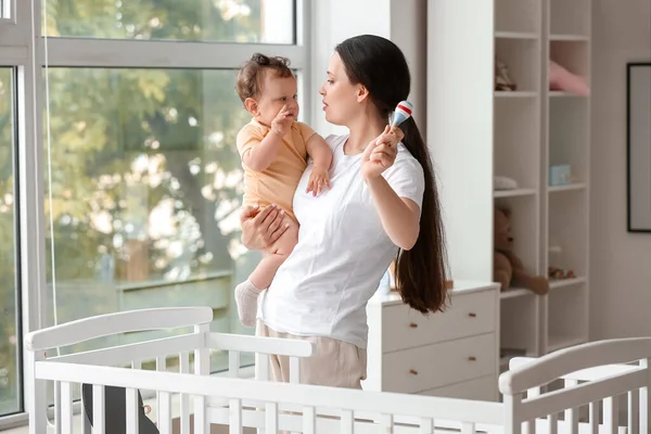 Young Mother Toy Holding Her Little Baby Home — Stock Photo, Image