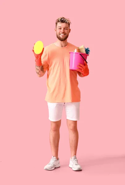 Handsome Young Man Cleaning Supplies Pink Background — Stock Photo, Image