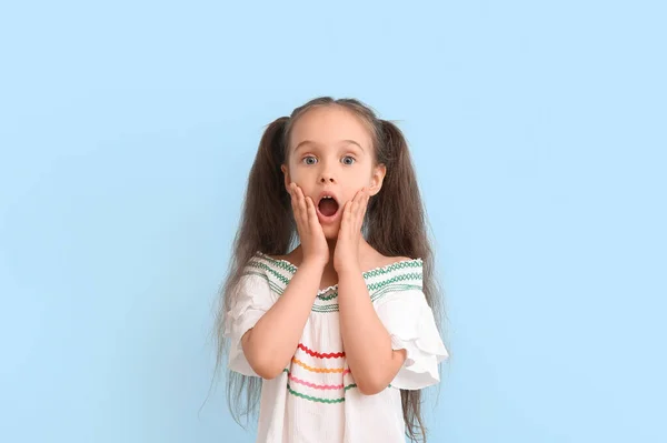 Portrait Shocked Little Girl Ponytails Blue Background — Stock Photo, Image