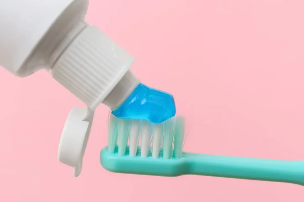 Squeezing Tooth Paste Brush Pink Background Closeup — Foto Stock