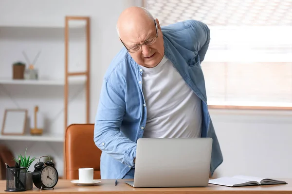 Senior Man Back Pain Using Laptop Home — Stock Fotó