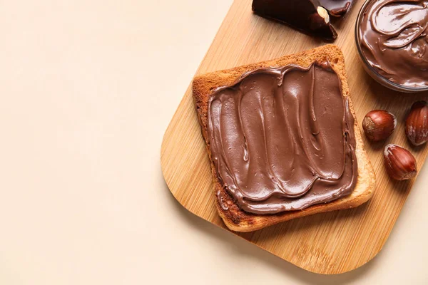 Board Bread Chocolate Paste Hazelnuts Beige Background Closeup — Stock Photo, Image