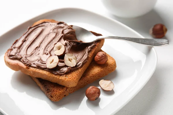 Plate Bread Chocolate Paste Hazelnuts White Background Closeup — Stock Photo, Image