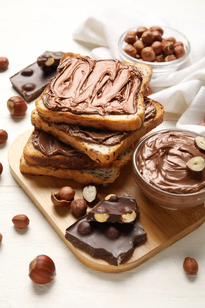 Board Bread Chocolate Paste Hazelnuts White Wooden Background — Stock Photo, Image