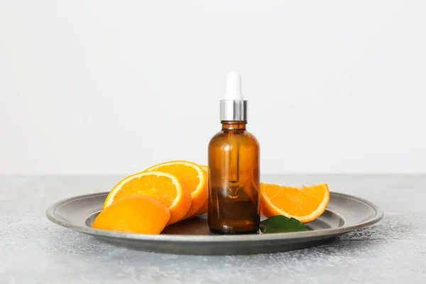 Bottle Essential Oil Fresh Orange Light Background — Stock Photo, Image