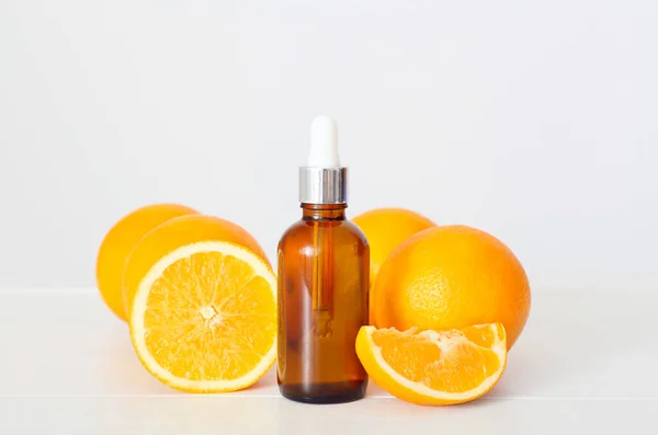 Bottle Essential Oil Fresh Oranges Light Wooden Table — Stock Photo, Image