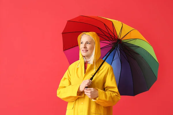 Beautiful Mature Woman Raincoat Umbrella Color Background — Stock Photo, Image