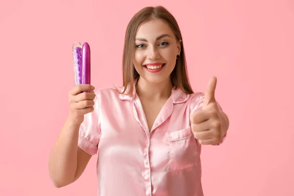 Young Woman Sex Toys Showing Thumb Color Background — Stockfoto